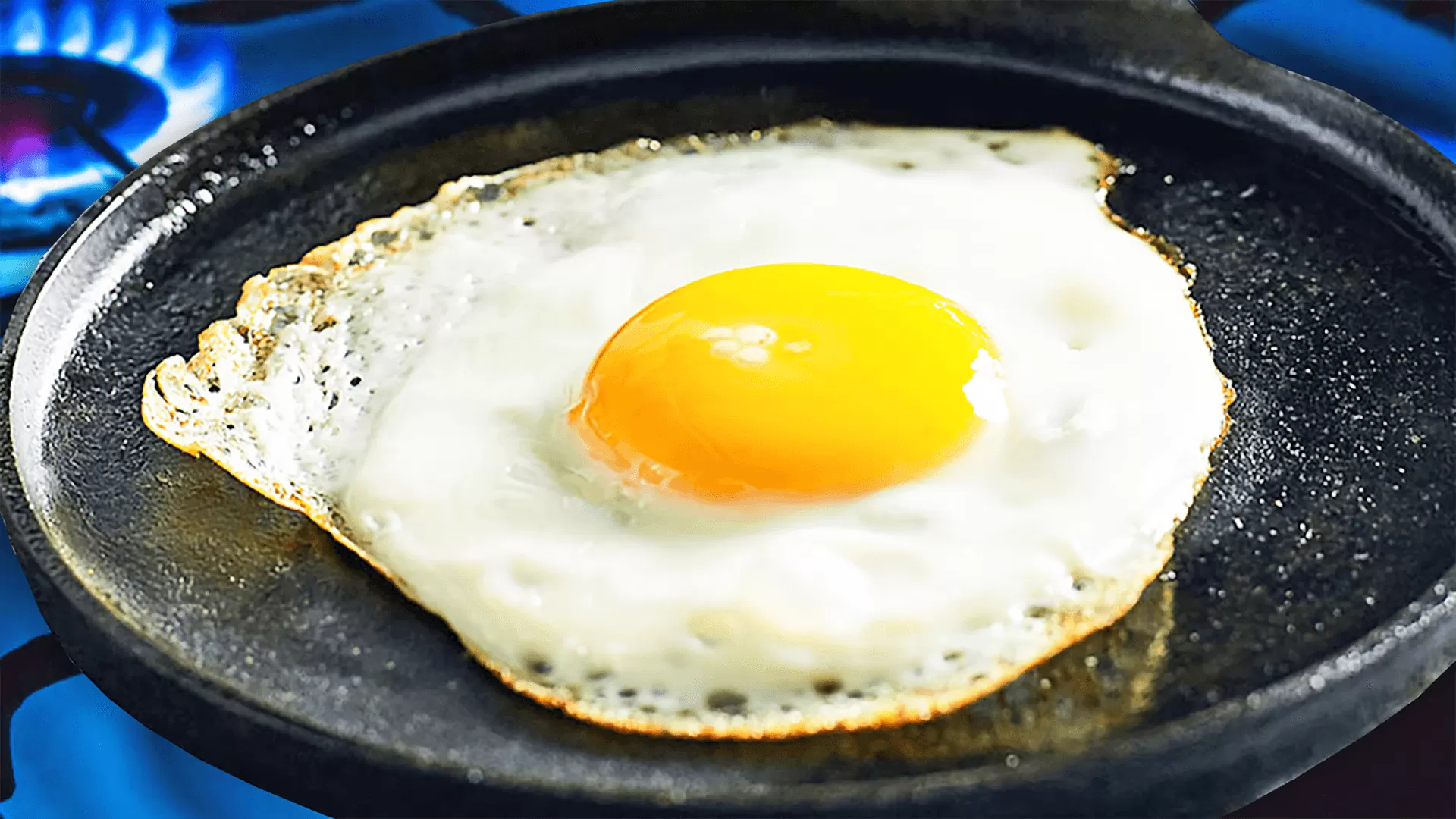 Cooking Sunny Side Up Eggs in a Pan on the Stove.