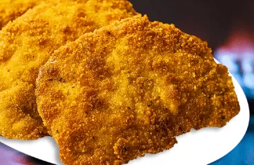 Authentic Wiener Schnitzel Recipe with Veal and Breadcrumbs<span class="rmp-archive-results-widget "><i class=" rmp-icon rmp-icon--ratings rmp-icon--star rmp-icon--full-highlight"></i><i class=" rmp-icon rmp-icon--ratings rmp-icon--star rmp-icon--full-highlight"></i><i class=" rmp-icon rmp-icon--ratings rmp-icon--star rmp-icon--full-highlight"></i><i class=" rmp-icon rmp-icon--ratings rmp-icon--star rmp-icon--full-highlight"></i><i class=" rmp-icon rmp-icon--ratings rmp-icon--star rmp-icon--half-highlight js-rmp-remove-half-star"></i> <span>4.3 (10)</span></span>