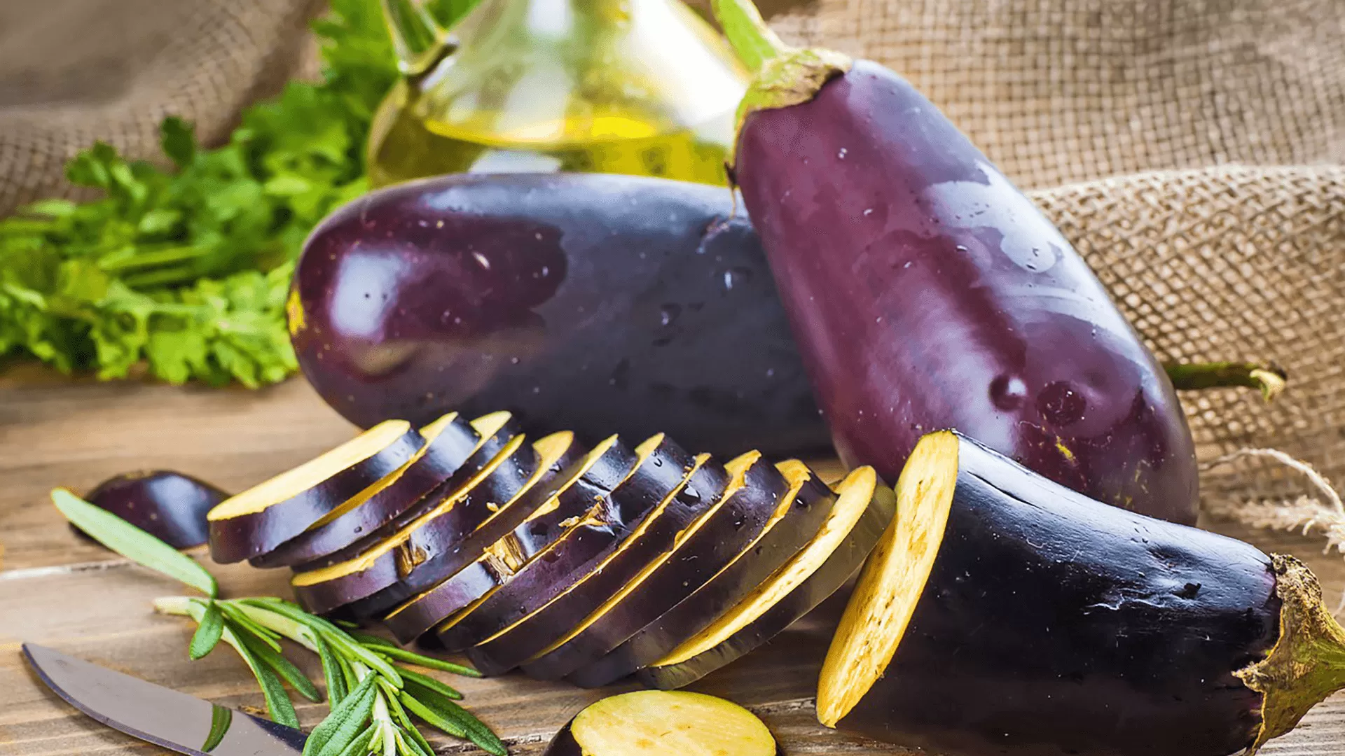 Whole and Sliced Eggplants