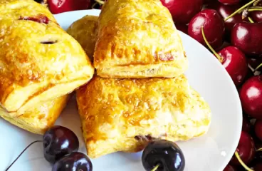Homemade Cherry Turnovers Recipe with Puff Pastry<span class="rmp-archive-results-widget "><i class=" rmp-icon rmp-icon--ratings rmp-icon--star rmp-icon--full-highlight"></i><i class=" rmp-icon rmp-icon--ratings rmp-icon--star rmp-icon--full-highlight"></i><i class=" rmp-icon rmp-icon--ratings rmp-icon--star rmp-icon--full-highlight"></i><i class=" rmp-icon rmp-icon--ratings rmp-icon--star rmp-icon--full-highlight"></i><i class=" rmp-icon rmp-icon--ratings rmp-icon--star rmp-icon--full-highlight"></i> <span>5 (5)</span></span>